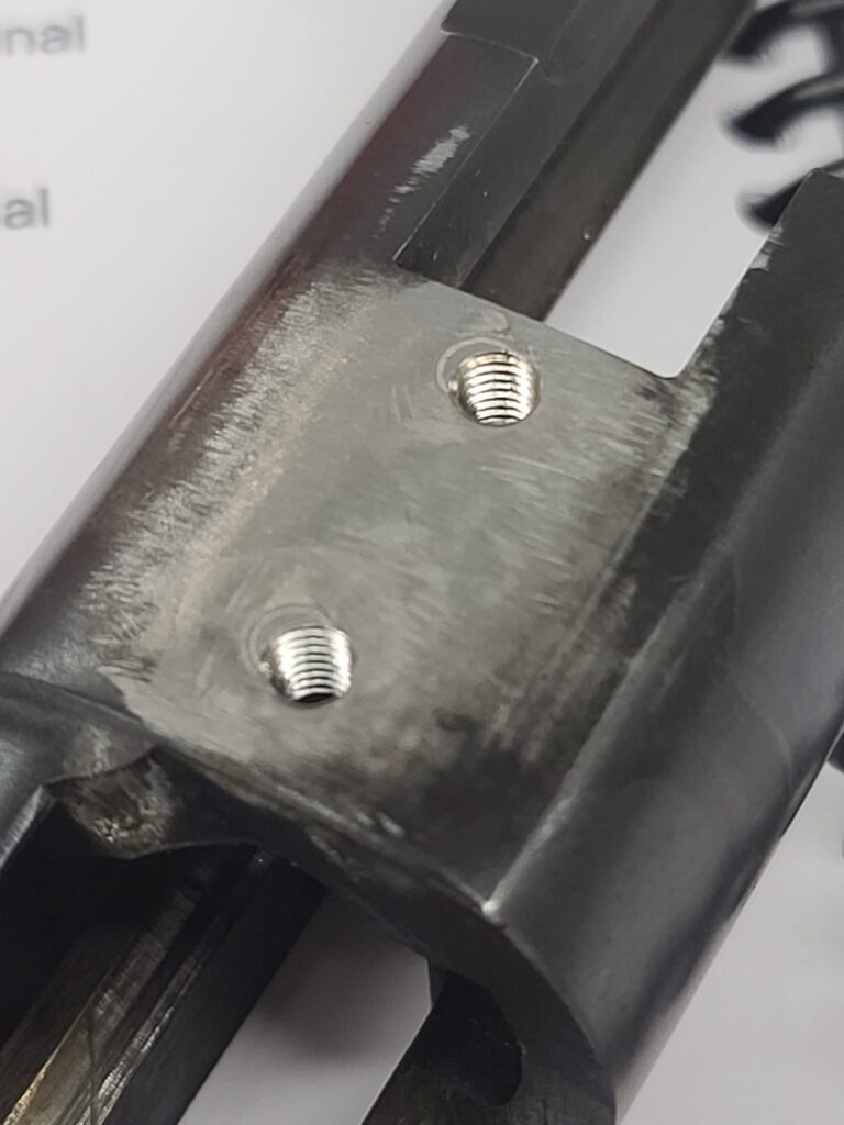 GUNSMITHING SERVICES:  Receiver scope base screw hole restoration and correction