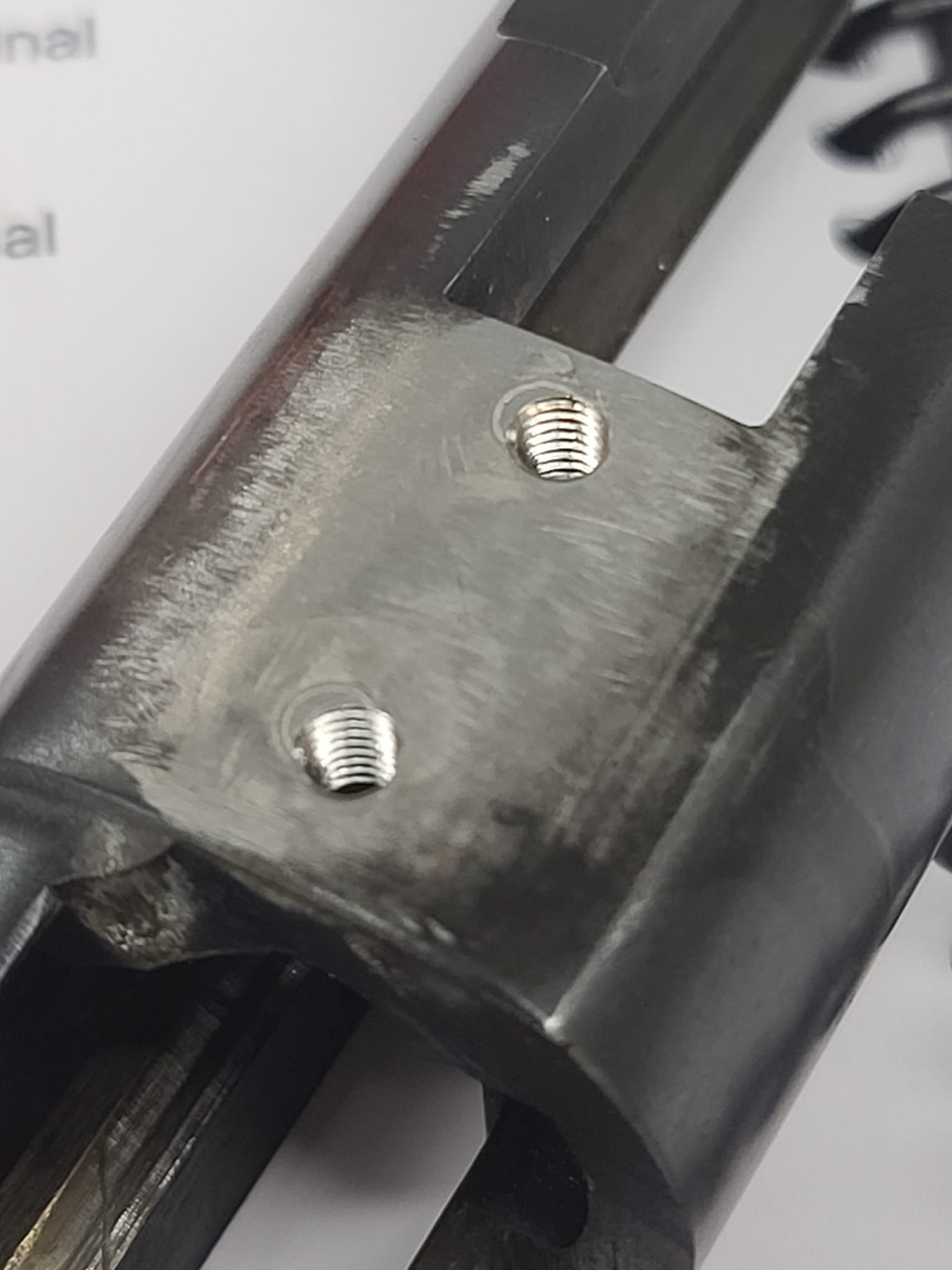 GUNSMITHING SERVICES: Receiver scope base screw hole restoration and correction
